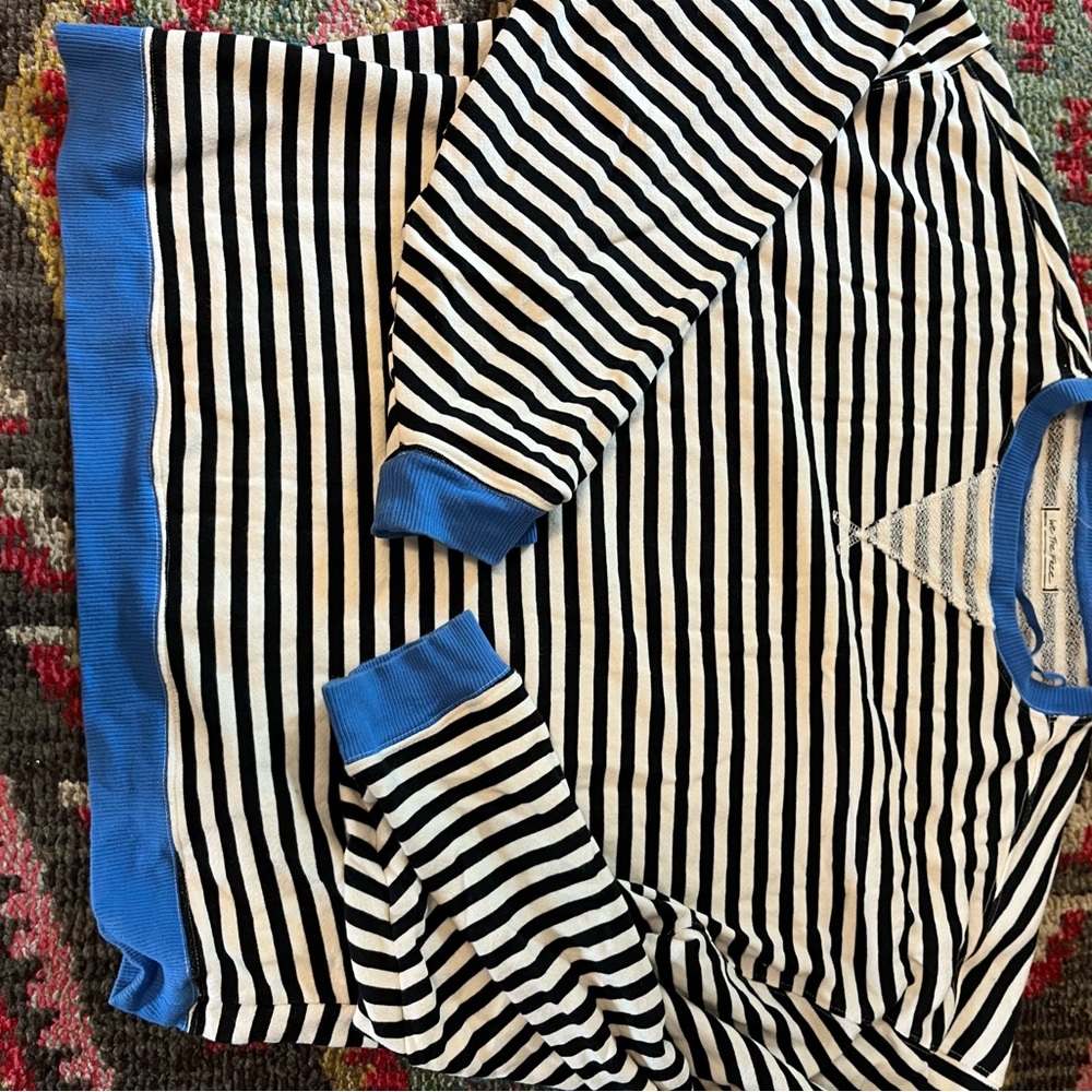 We The Free Striped Black and White Sweater with Blue Accents size medium.